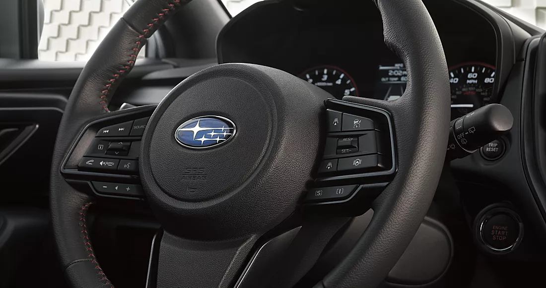 Impreza steering wheel with audio and cruise controls